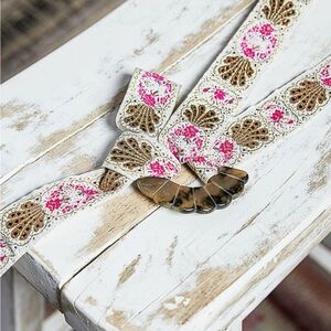 New in bag POL Floral Embroidered Belt in Pink and Gold with shell buckle.